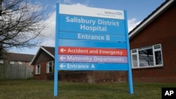 A entrance sign stands outside Salisbury Memorial Hospital where former Russian double agent Sergei Skripal and his daughter, Yulia, were taken after being found critically ill March 4, 2018, in Salisbury, England. 