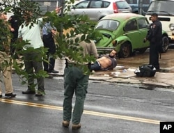 Ahmad Khan Rahami is taken into custody after a shootout with police Monday, Sept. 19, 2016.