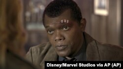 This image released by Disney-Marvel shows Samuel L. Jackson as a younger Nick Fury in a scene from the film "Captain Marvel."