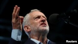 Britain's Labor Party leader Jeremy Corbyn speaks during a rally ahead of his party's annual conference, in Liverpool, England, Sept. 22, 2018.