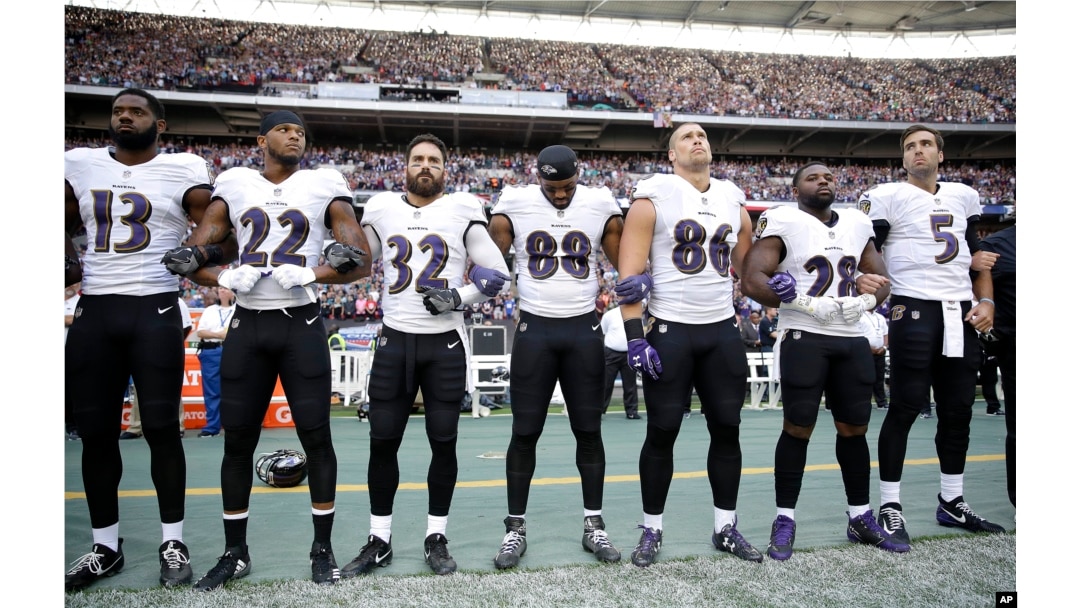 Ravens and Jaguars Players Kneel and Lock Arms During National Anthem