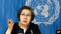 FILE - Yanghee Lee, Special Rapporteur on the situation of human rights in Myanmar, delivers her report during the 34th session of the Human Rights Council, at the European headquarters of the United Nations in Geneva, Switzerland, March 13, 2017.