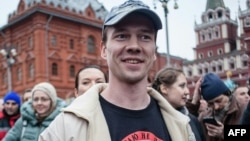 FILE - Ildar Dadin is shown participating in a rally in support of a detained anti-government activists at Manezhnaya Square in Moscow, Russia, April 6, 2014.