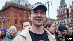 FILE - Ildar Dadin is shown participating in a rally in support of a detained anti-government activists at Manezhnaya Square in Moscow, Russia.