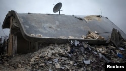 A house in Azaz destroyed by Syrian government rockets according to local residents, December 18, 2012. (Reuters) 