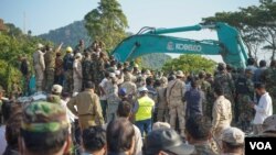 FILE- An operation in search of survivors at a collapsed building in Kep province, Sunday, January 5, 2020. (Khan Sokummono/VOA Khmer) 