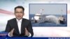 Vietnamese RapNews anchor raps the news. (VOA/Marianne Brown)
