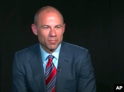 In this image from video, Michael Avenatti, attorney and spokesperson for adult film star Stormy Daniels, listens to a reporter's question during an interview in New York, March 21, 2018.