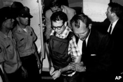 James Earl Ray being transported in Memphis, Tennessee, in this 1968 photo released by the Shelby County Register's office, March 31, 2011.