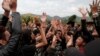 Punk community members dance during a punk music festival in Bandung, Indonesia West Java province, March 23, 2017. Picture taken March 23, 2017.