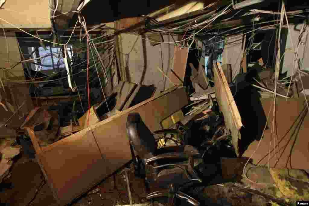 A view shows the destruction at the site of an explosion inside a Syrian state television building in Damascus August 6, 2012.