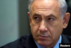 Israel's Prime Minister Benjamin Netanyahu attends the weekly cabinet meeting in Tel Aviv, June 15, 2014.