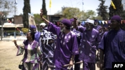 FILE - Ben Ami Ben Israel (C), spiritual leader of African Hebrews, is seen with followers at a celebration May 26, 2010, in the southern Israeli town of Dimona.