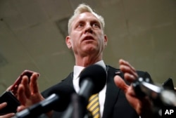 FILE - Acting Defense Secretary Patrick Shanahan speaks to reporters on Capitol Hill in Washington, May 21, 2019.
