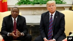 President Donald Trump sits with Kenyan President Uhuru Kenyatta in the White House, Aug. 27, 2018. 