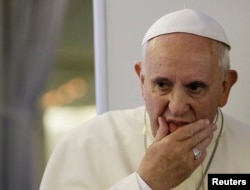 FILE - Pope Francis has said he believes humanity primarily is responsible for climate change.