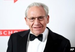 FILE - Bob Woodward attends the 2019 PEN America Literary Gala at the American Museum of Natural History on Tuesday, May 21, 2019, in New York. (Photo by Evan Agostini/Invision/AP)