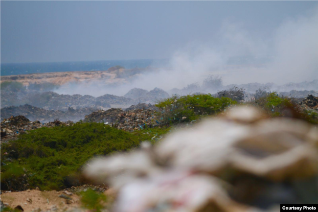 Smoke rises from piles of garbage dumped on Jazeera Beach, in Somalia's capital, Mogadishu. (Courtesy - Jamal Ali)