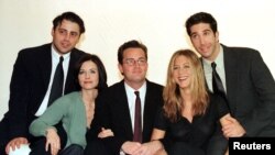 FILE - The cast of the American TV sitcom "Friends," left to right, Courteney Cox, Matt Le Blanc, Matthew Perry, David Schwimmer and Jennifer Aniston, March 25.