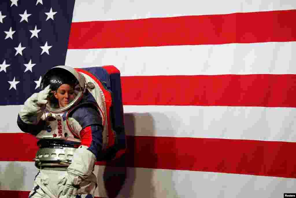 Advanced Space Suit Engineer of NASA Kristine Davis wears the xEMU prototype space suit for the next astronaut to the moon by 2024, during its presentation at NASA headquarters in Washington, Oct. 15, 2019.