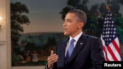 FILE - U.S. President Barack Obama is seen during an interview in the Diplomatic Reception Room in the White House, in Washington, D.C.