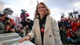 FILE - Journalist Ksenia Sobchak, then a Russian presidential candidate, casts her ballot for the Russian presidential election, in Moscow, Russia, March 18, 2018.