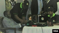 President Robert Mugabe registering to vote as Zimbabwe prepares for 2018 general elections.