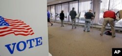 People vote during early voting for the 2016 General Election at the Salt Lake County Government Center on Nov. 1, 2016, in Salt Lake City.