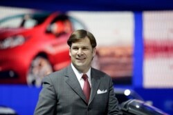 Ford Motor Co. executive Jim Farley is seen in the automaker's display area at the North American International Auto Show in Detroit, Jan. 13, 2014.