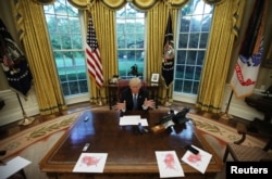 U.S. President Donald Trump speaks during an interview with Reuters in the Oval Office of the White House in Washington, April 27, 2017.