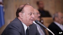 Yemeni Vice President Abd-Rabbu Mansour Hadi addresses a meeting of the ruling General People's Congress party in Sana'a, December 7, 2011.
