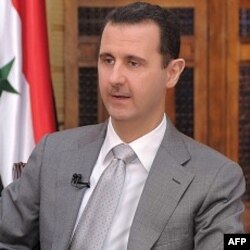 Bashar al-Assad tinimsiz namoyishga chiqayotgan fuqarolarni "terroristlar" deb ataydi