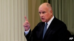 FILE - California Gov. Jerry Brown delivers his annual State of the State address before a joint session of the Legislature in Sacramento, Calif., Jan. 25, 2018.