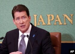 FILE - U.S. Ambassador to Japan William Hagerty speaks during a news conference at the Japan National Press Club in Tokyo, Nov. 17, 2017.