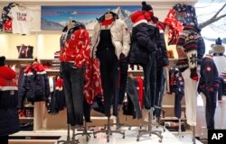 Clothing by Polo Ralph Lauren to be worn by Team USA athletes in the upcoming Winter Olympics in South Korea is displayed on mannequins in the brands's Prince Street store, Monday, Jan. 22, 2018, in New York.