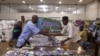 People work at the Batex.Ci textile company factory in Bamako, Dec. 19, 2012. 