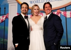 Cast member Lin Manuel-Miranda, Emily Blunt and director Rob Marshall pose at the world premiere of Disney's movie "Mary Poppins Returns" in Los Angeles, Nov. 29, 2018.