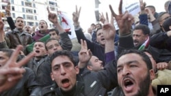 Algerian protesters chant slogans during a demonstration in Algiers, Algeria, February 12, 2011