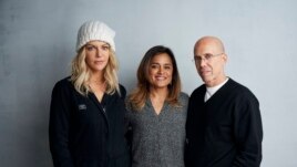 Kaitlin Olsonfrom left, Veena Sud and Jeffrey Katzenberg pose for a portrait to promote the film 