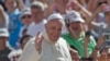 FILE - Pope Francis arrives for his weekly general audience in St. Peter's Square, Aug. 26, 2015.