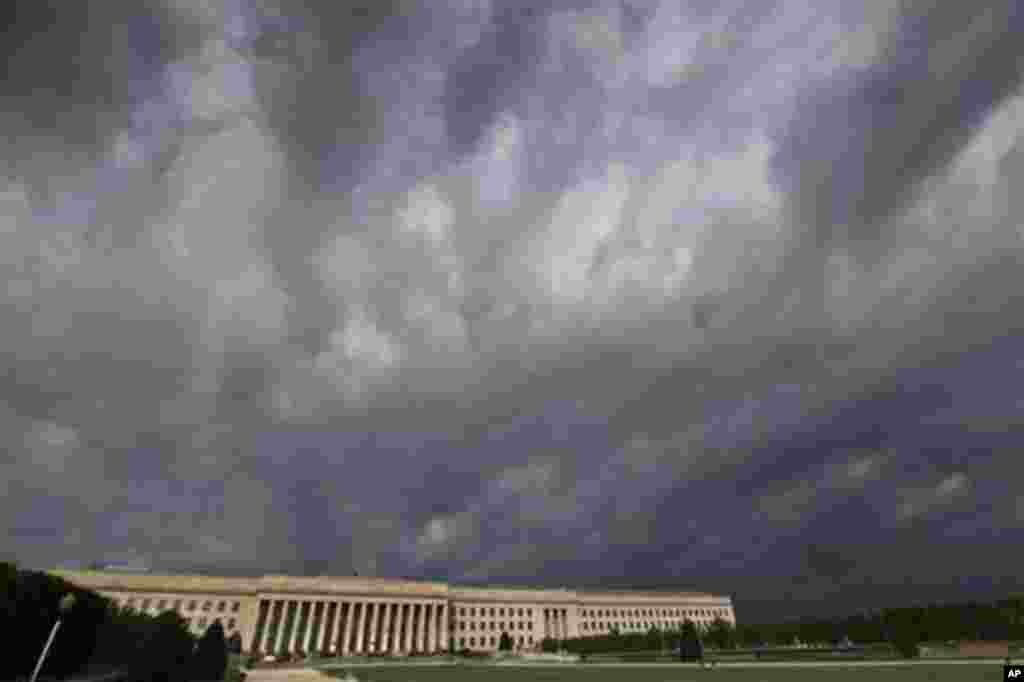 Storm clouds pass over the Pentagon,Thursday, April 28, 2011, during tornado alerts in the Washington region. (AP Photo/J. Scott Applewhite)