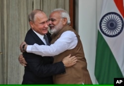 روسی صدر ولادی میر پوٹن اور بھارتی وزیر اعظم نریندر مودی ، فائل فوٹو