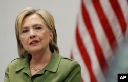 Democratic presidential candidate Hillary Clinton speaks to media as she meets with law enforcement leaders at John Jay College of Criminal Justice in New York, Aug. 18, 2016.