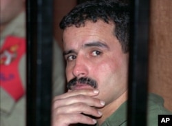 FILE - Jordanian soldier Ahmad Daqamseh, who killed seven Israeli schoolgirls, during the trial in army base in Naour 30 kilometers (18miles) west of Amman, June 15 1997.