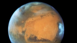 This May 12, 2016 image provided by NASA shows the planet Mars. (NASA/ESA/Hubble Heritage Team - STScI/AURA, J. Bell - ASU, M. Wolff - Space Science Institute via AP)