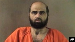 Undated file photo shows Army psychiatrist Maj. Nidal Hasan. A military jury has sentenced Hasan to death for the 2009 shooting rampage at Fort Hood that killed 13 people and wounded more than 30 others.