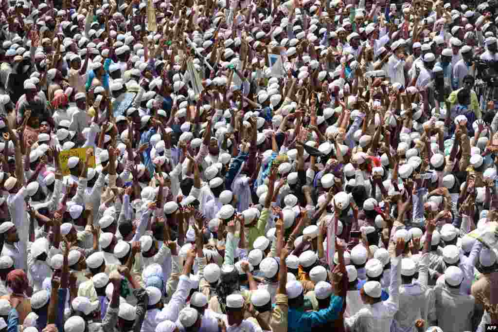 Members of Islamist groups gather during a rally to siege Myanmar's embassy for the recent violence against Rohingya Muslim in Myanmar, in the Bangladeshi capital of Dhaka.