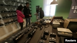 Tourists visit the Museum of Surveillance in Tirana, Albania, Nov. 2, 2017. It was created in the former headquarters of the feared Sigurimi security service.