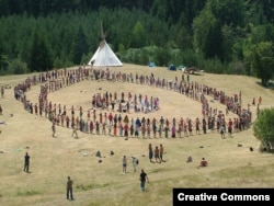 Dancers and a tipi at the European Rainbow Gathering in Bosnia, 2007. New age movements and Indian "hobbiests" have appropriated many elements of Native American cultures and spirituality.