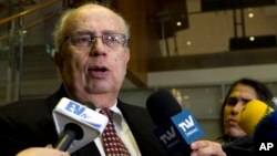 FILE - Organization of American States (OAS) Permanent Representative Ambassador of Venezuela, Gustavo Tarre, speaks during a news conference at OAS headquarters in Washington, Feb. 11, 2019. 